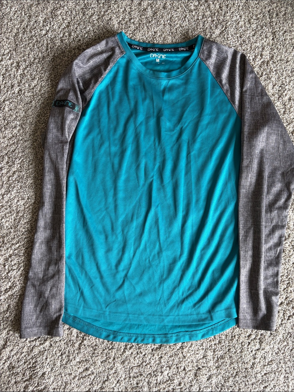 Dakine mountain bike jersey-Teal Body with Gray sleeves.